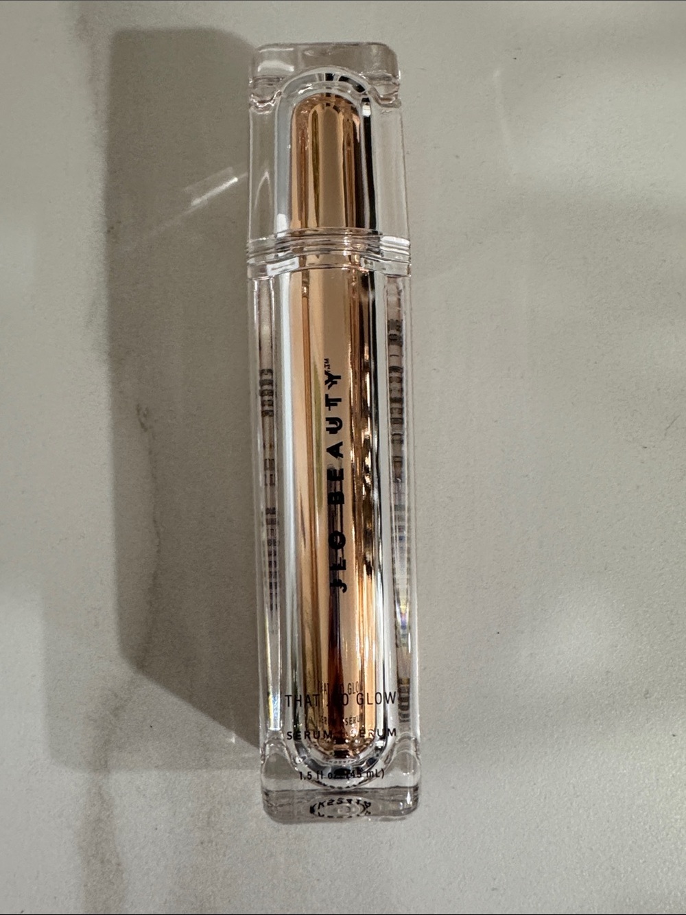 JLO Beauty Tighten Brighten serum